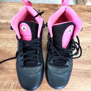 Girls black and pink Jordan mids
